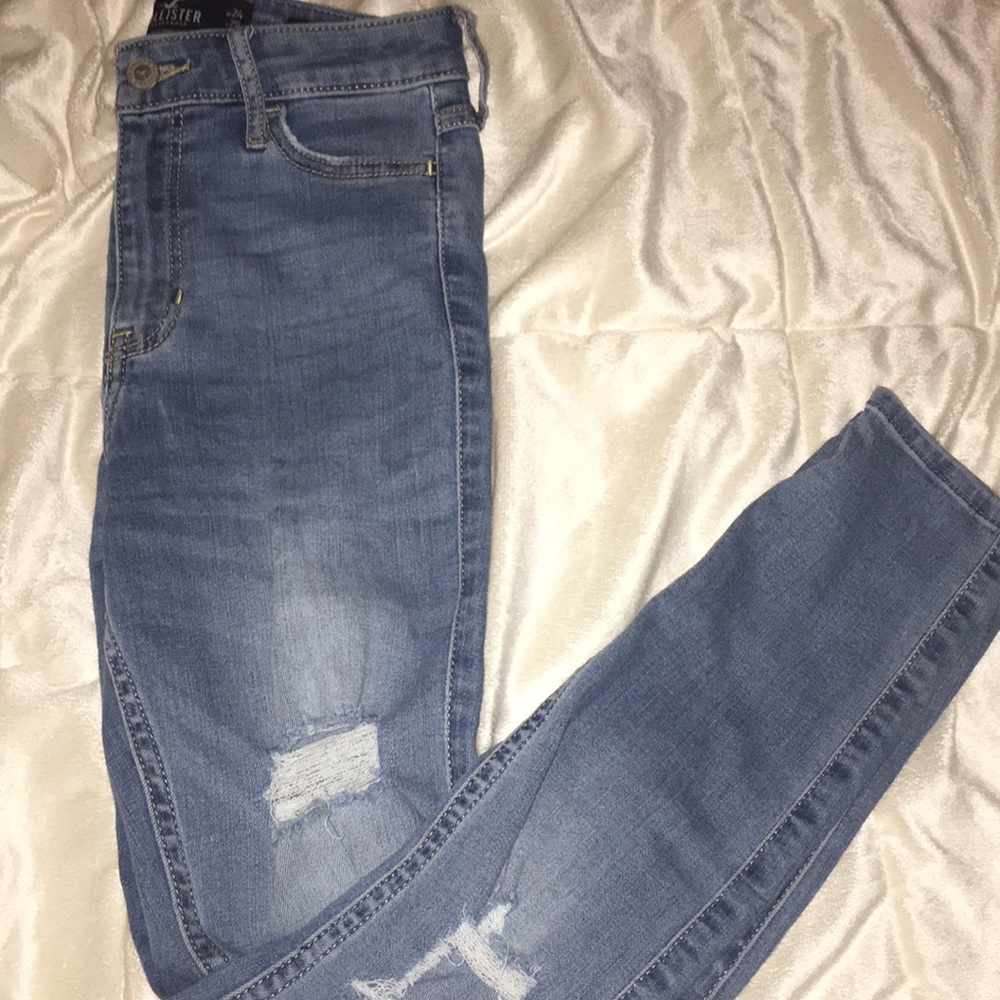 Super skinny ripped blue jeans